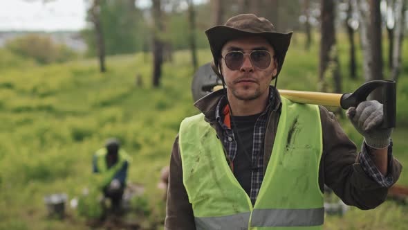 Caucasian Gardener with Shovel