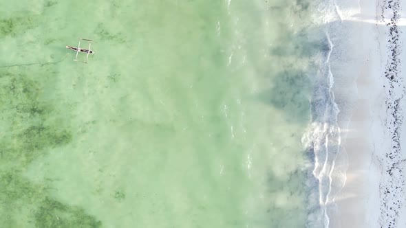 Vertical Video of the Ocean Near the Coast of Zanzibar Tanzania Aerial View