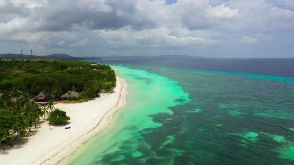 Sandy Beach and Tropical Sea