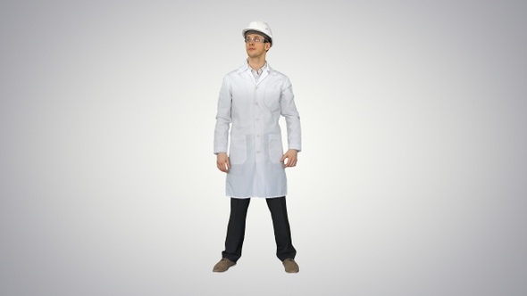 Scientist Engineer in white robe safety helmet and glasses