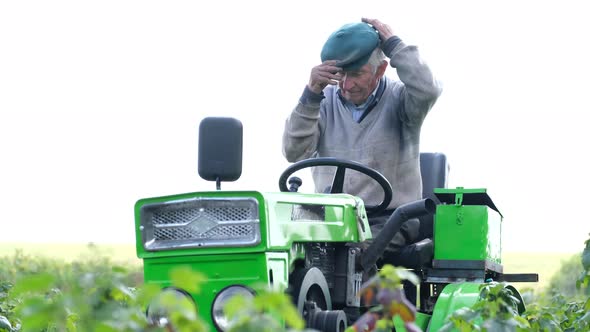 A Village Worker in His Garden is Preparing for the Harvest