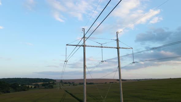 Tower with Electric Power Lines for Transfering High Voltage Electricity Located in Agricultural