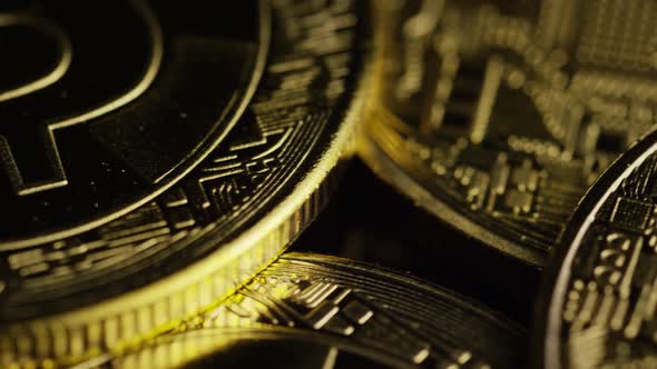Rotating shot of Bitcoins (digital cryptocurrency) - BITCOIN 0600
