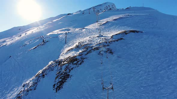 Ski Resort with Empty Chairlifts on Snowy Mountain Slope