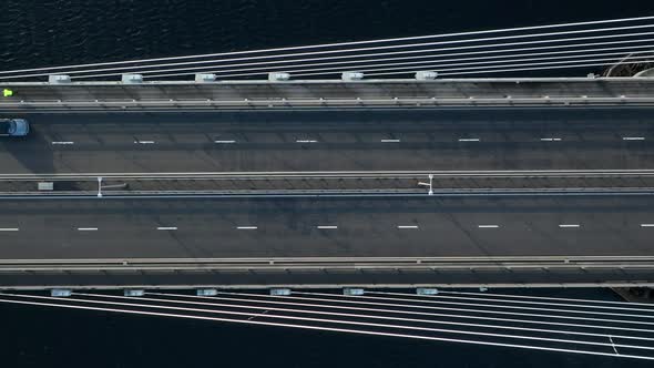 Vehicles Crossing a Suspension Cable Stayed Bridge in Slow Motion