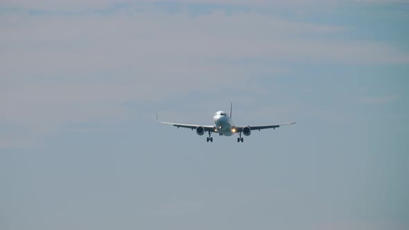 Airplane Flying Overhead for Landing