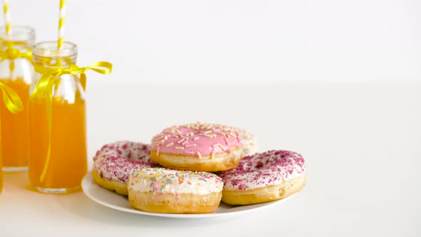 Donuts and Lemonade or Juice in Glass Bottles