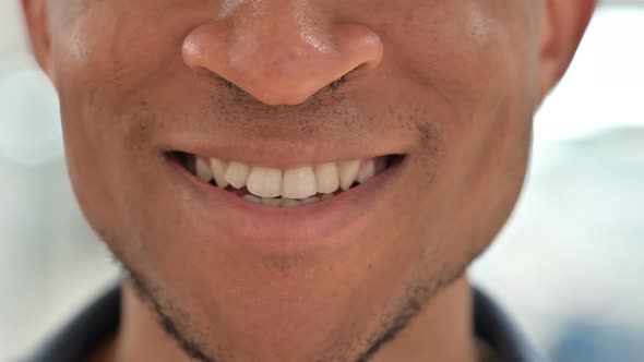 Close Up of Mouth of Casual African Man Smiling 