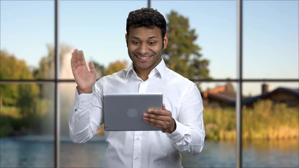 Cheerful Businessman Talking Via Internet