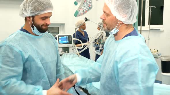 Surgeons Shake Their Hands