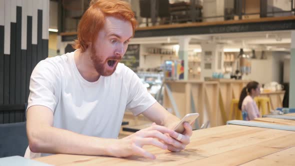 Celebration By Excited Redhead Beard Designer in Cafe