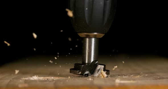 Wood Chip Turning on a Wood Board, Making Chips, Slow Motion 4K