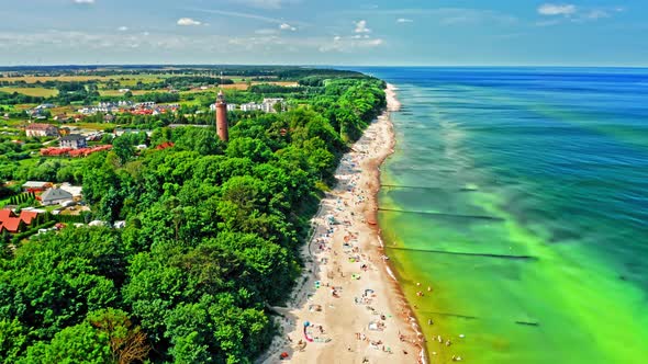 Aerial view of crowded beach with people in Baltic Sea