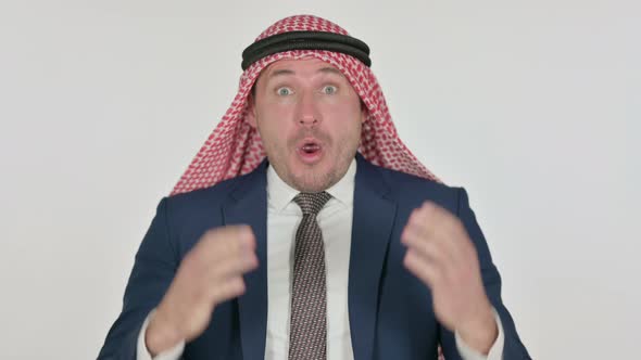 Disappointed Arab Businessman Reacting to Loss, White Background