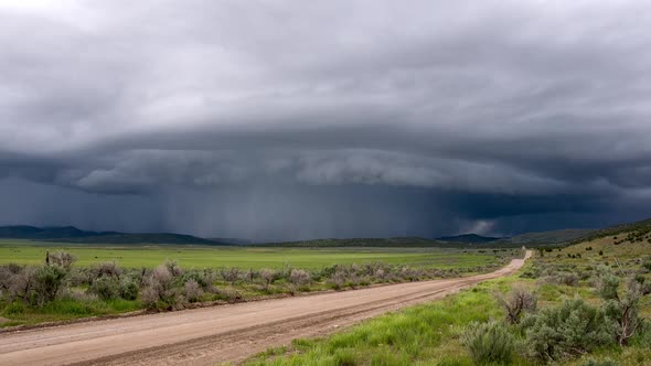 Time lapse of shelf cloud storm moving over the landscape