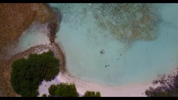 Aerial above travel of paradise coastline beach voyage by blue sea with white sand background of a d