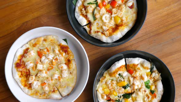 Seafood Pizza with Mozzarella Cheese and Basil