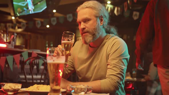 Handsome Mature Man In Pub