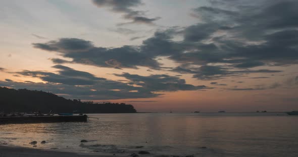 Timelapse Sunrise From Dark to Bright Day Sun Over Sea Waves are Washing