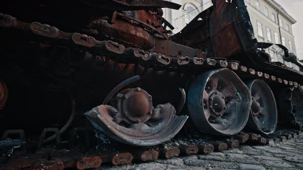 Caterpillar and Wheels Track of Burnedout Russian Tank