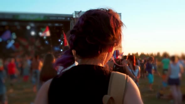 Woman Running to Stage