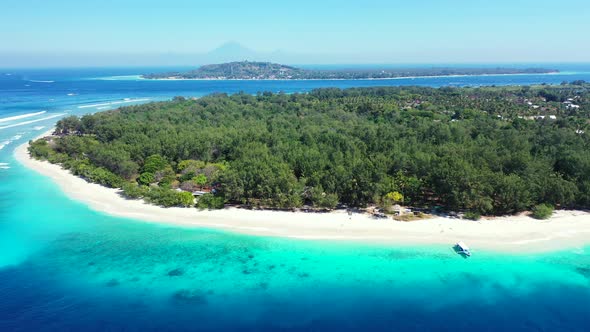 Wide angle aerial abstract view of a summer white paradise sand beach and blue water background in c