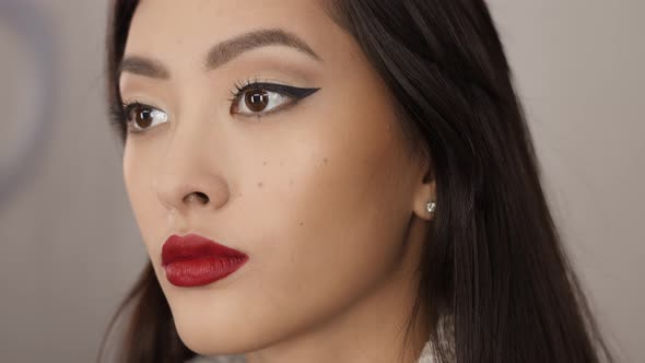 Makeup Artist Complete Make-up for Asian Woman