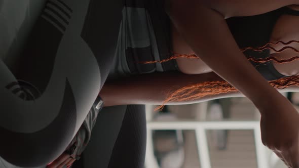Verical Video Fit Black Woman Wearing Sportswear Sitting on Yoga Swiss Ball
