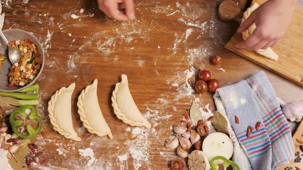 Man Cooking Empanadas Argetinian Pie Traditional Bakery From Argentina Chef Filling Dough in Home