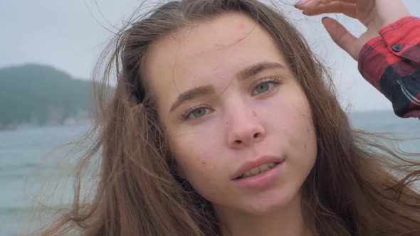 Closeup Portrait of Beautiful Young European Girl on Tropical Beach Sea on the Background