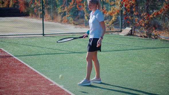 Tennis.Woman Playing In Tennis.Woman With Racket Playing In Tennis Sets Mach.Tennis Court