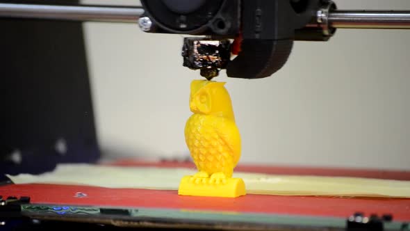 3D Printer Builds Up the Object Yellow Color Closeup