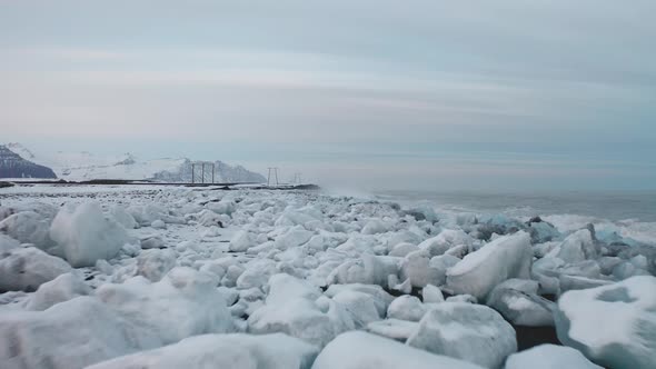 Aerial View of the J Kuls Rl n Glacial Lagoon and Floating Icebergs. The Beginning of Spring in