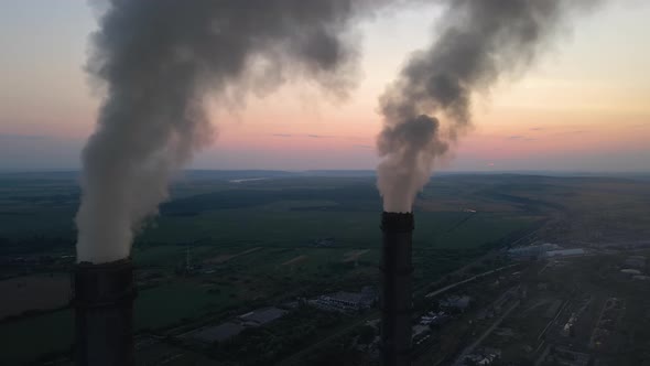 Aerial View of Coal Power Plant High Pipes with Black Smoke Moving Upwards Polluting Atmosphere at