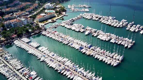 Drone view on beautiful Fethiye city and Fethiye harbor full of yachts and boats