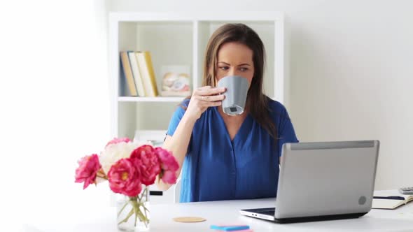 Woman with Laptop and Coffee at Home or Office 2