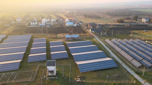 Aerial View of Large Sustainable Electrical Power Plant with Rows of Solar Photovoltaic Panels for