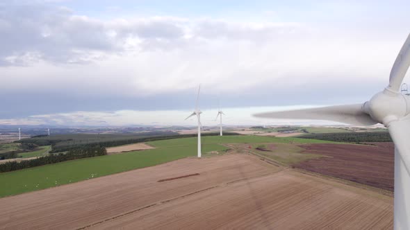 Close Up Aerial View of A Wind Turbine Generating Renewable Energy