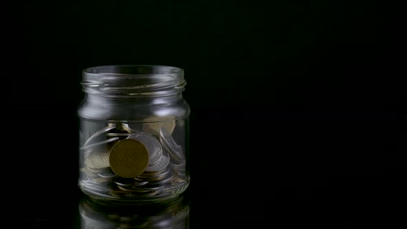 Money Coin in Glass Jars Growing Money