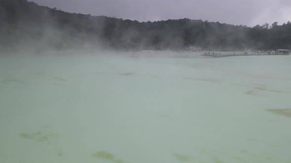 Aerial view fly through smoky in white crater, bandung, Indonesia