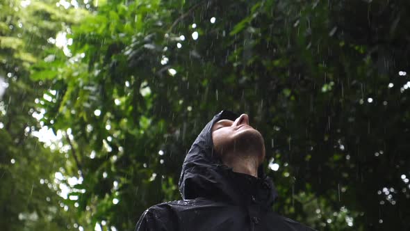 Man Standing In The Rain