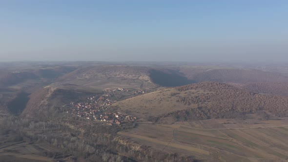 Eastern Serbian landscape with small settlement  4K drone footage