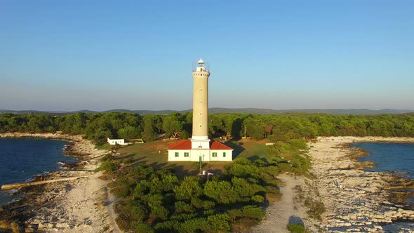 Aerial view of a lighthouse, Croatia with landscape in the background