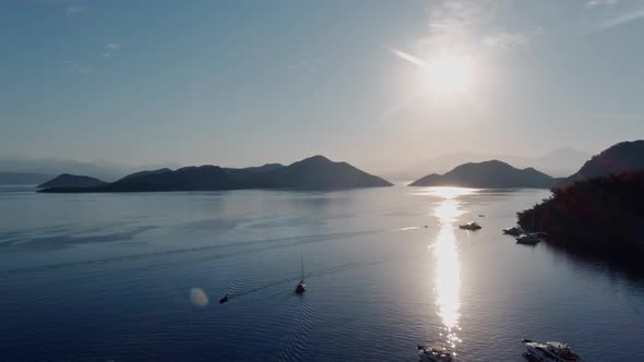 Aerial Footage of the Picturesque Bay of the Many Islands Near Marmaris at Sunrise Lone Sailing