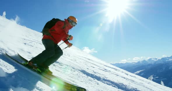 Person snowboarding on snowy mountain