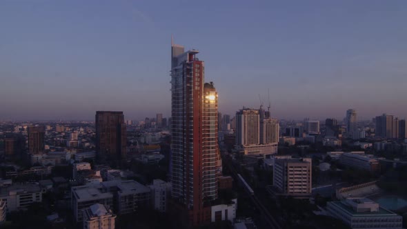 Sunlight Glowing On Skyscraper In City