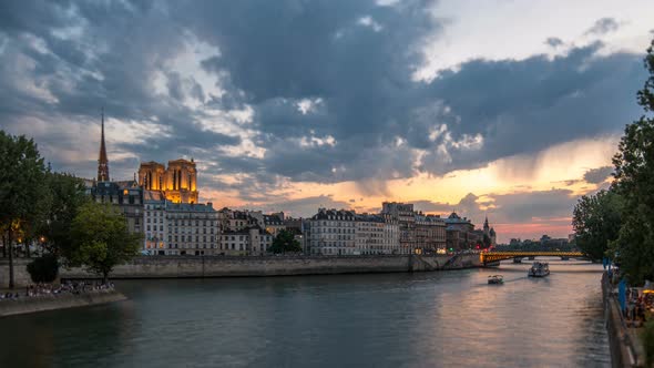 People and Boats Day to Night Timelapse Le Pont D'Arcole Bridge After Sunset Paris France Europe