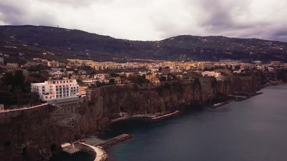 Aerial view of the coastal town of Sorrento in Italy at sunset or sunrise, a beautiful landscape of