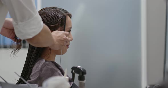 Process of dyeing hair at beauty salon