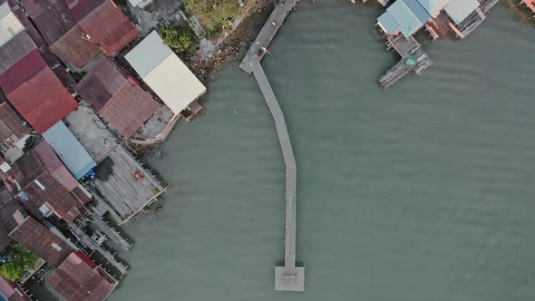 Drone Over Pier And Waterfront Buildings Of George Town